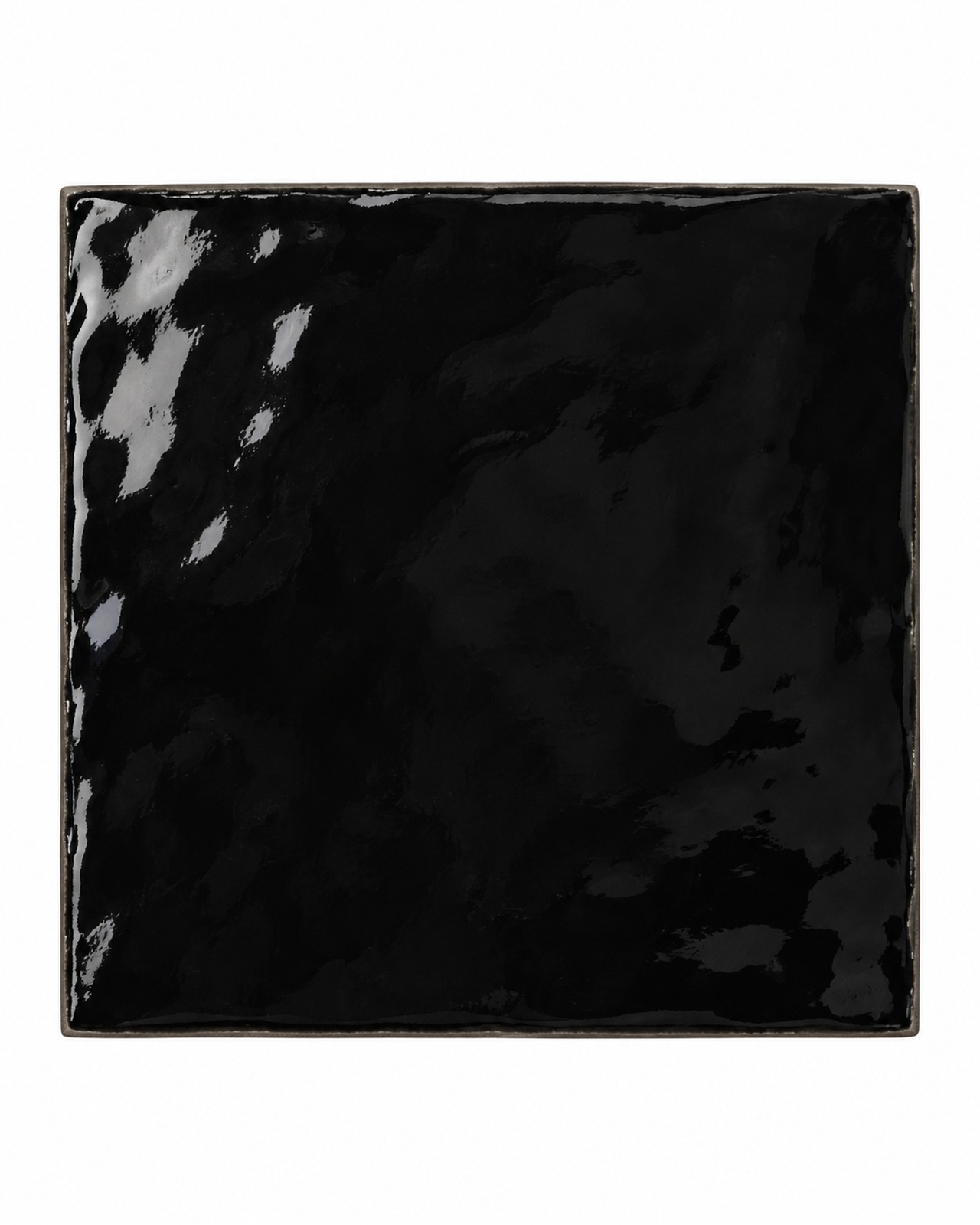 Mindelo Glans Zwart 13x13 glanzende zwarte wandtegel op een witte achtergrond
